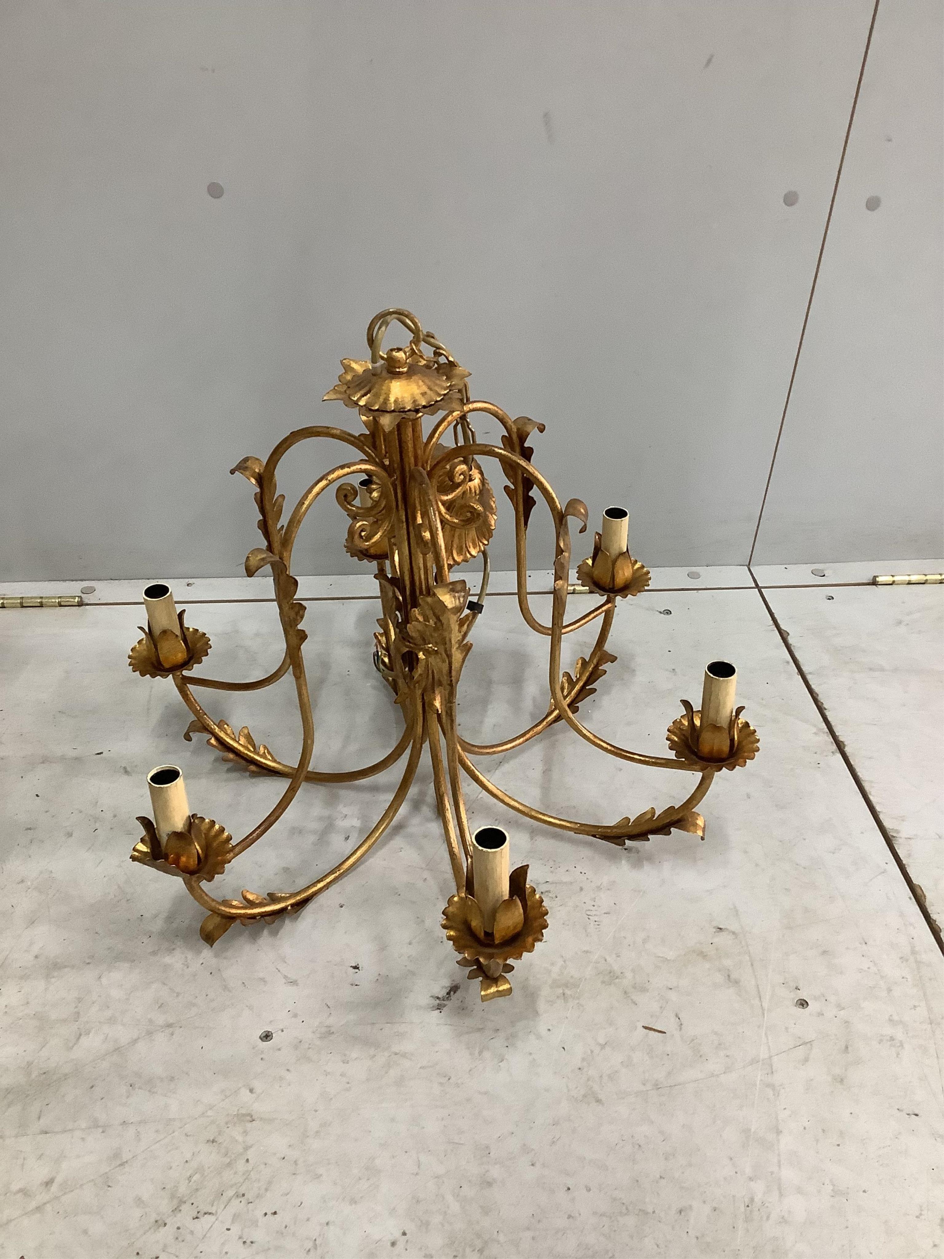 A pair of modern gold painted metal light fittings, diameter 60cm, height overall 80cm. Condition - good